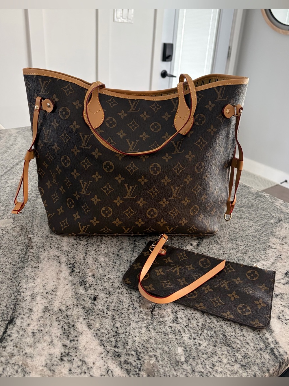 Monogram Canvas Tote with Removable Pouch in Brown and Tan. Dust bag included